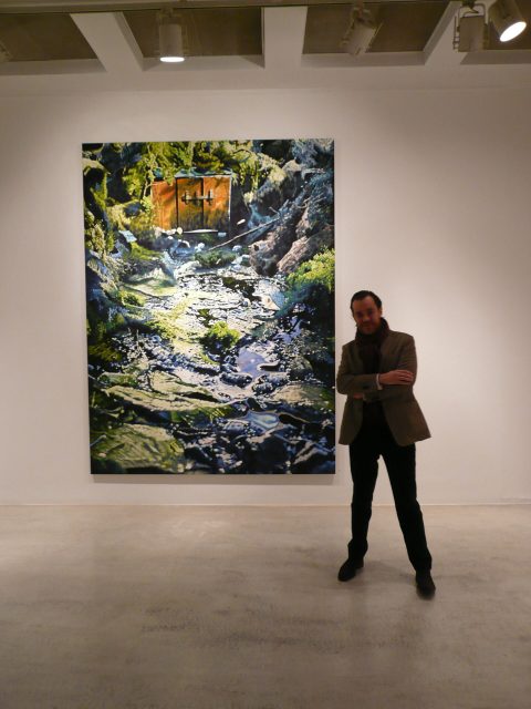 Antonio standing in front of Philipp Fröhlich's painting at the 2007 exhibition at Soledad Lorenzo.