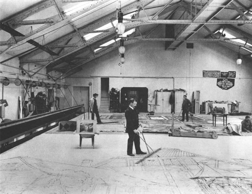 Theatre painters at work on a large backdrop in 1911