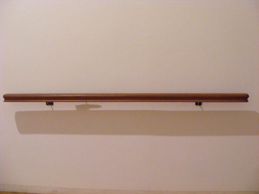 Handrails are a guidance system. This one, by Juan Muñoz, conceals a knife.
