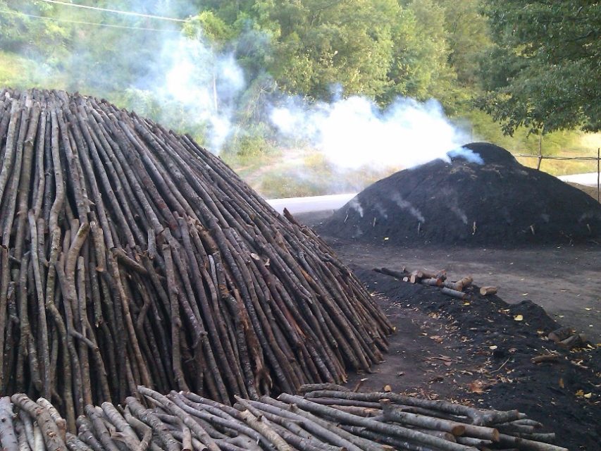 The smoke is heavy and dense at first; when it becomes light and blue, the burn is nearly complete.