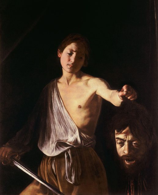 Caravaggio Caravaggio, David with the Head of Goliath. David seems to emerge from the black background, the darkness intensifying the painting’s drama and moral tension.