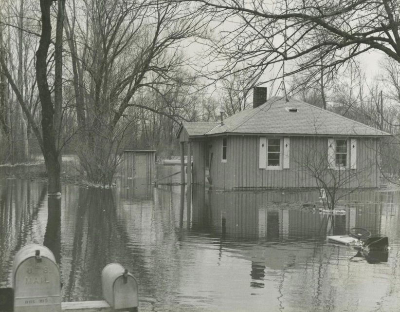 The cabin on Black Hawk Island where Lorine Niedecker lived, shown here during a flood.