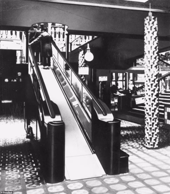Early escalator installation at Harrods department store, London.