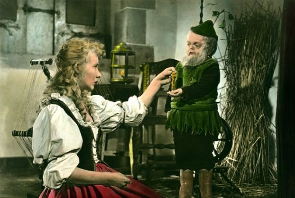 Still from a West German film adaptation of Rumpelstilzchen, 1955. The tale begins with a lie: the miller tells the king that his daughter can spin straw into gold.