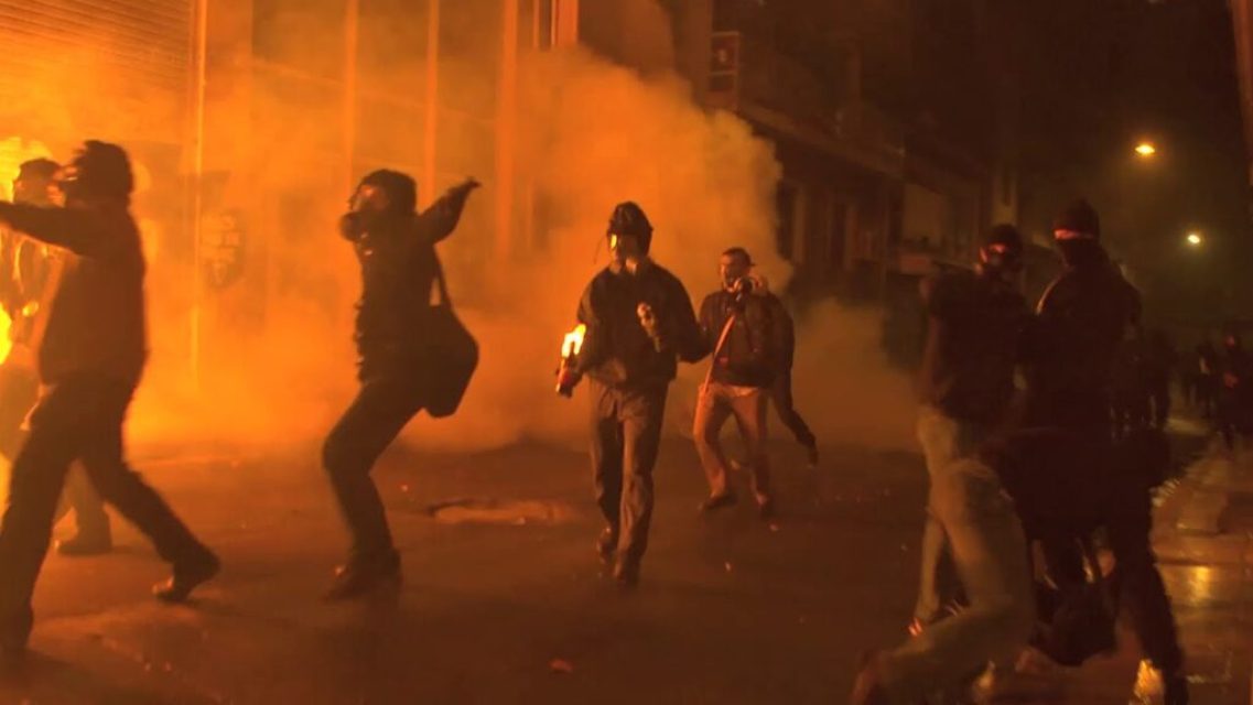 Demonstrators and tear gas, Athens, 2008.